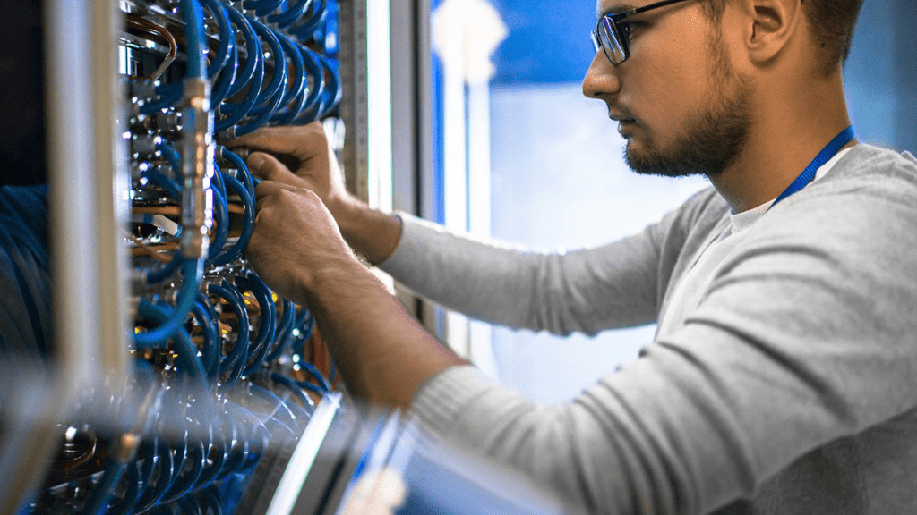 A man conducting On-Site support of the IT infrastructure.